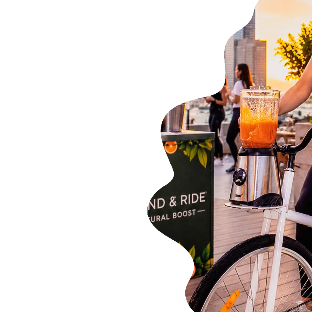 a smoothie shaker on top of bike in at an event