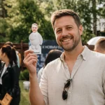 the guy happy to hold bubble head doll