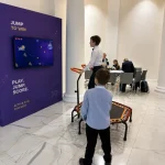 kids jump on interactive trampoline