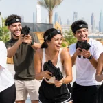 Group of people playing laser tag game