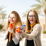girls playing nerf