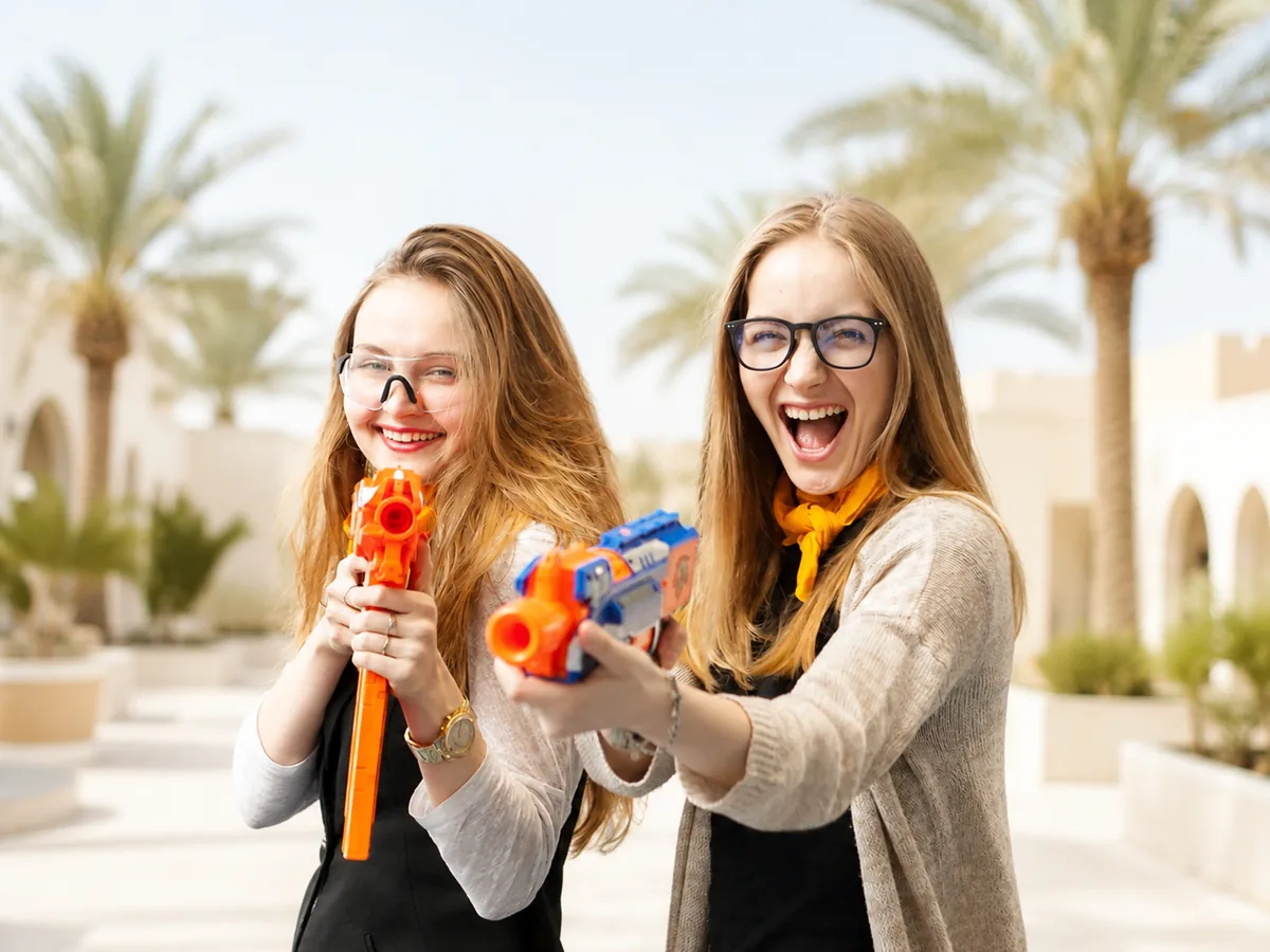 girls playing nerf