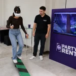 girtl playing VR Free Fall game