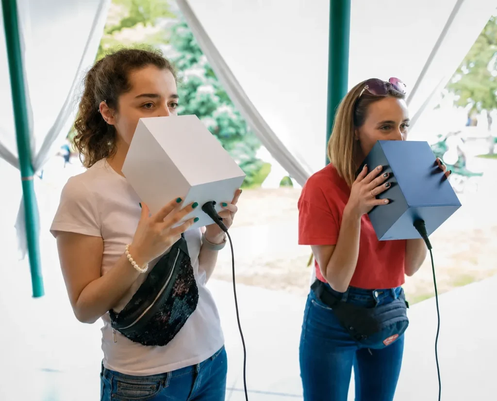 two girls playing who is louder