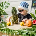 girl playing music on a fruits